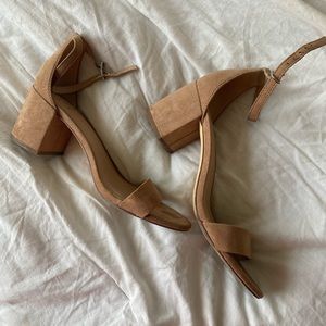 Tan baby heels.